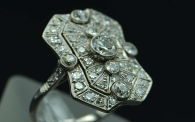 Platinum art-deco style ring with diamonds 21st century. Europe. Platinum, diamond 0.45 ct, diamonds 1.5 ct. Weight 6.15 g, inner diameter 17.67 mm