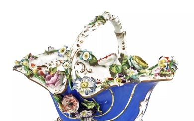 Porcelain vase-basket with molded flowers.