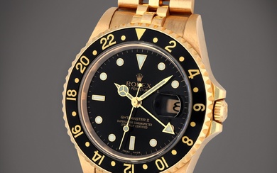 Rolex GMT-Master II, Reference 16718T | A yellow gold dual...