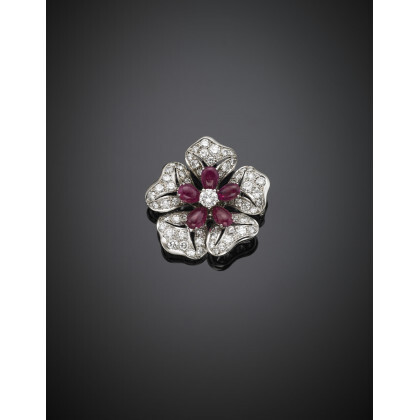 Round diamond and pear cabochon ruby white gold pansy brooch, diamonds in all ct. 3.50 circa, rubies in all ct.…Read more