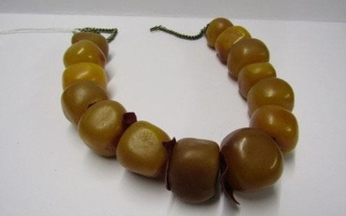 STRING OF UNTESTED HONEY COLOUR BAKELITE AMBER BEADS, approx...