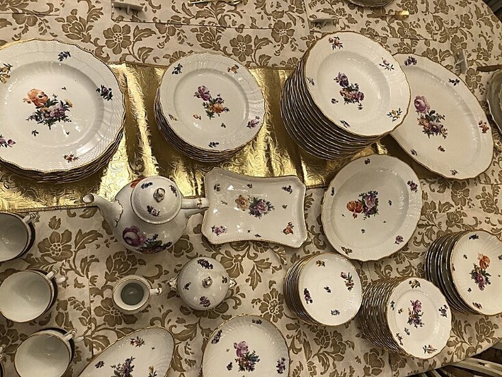 NOT SOLD. “Saxon Flower” porcelain coffee and dinner service decorated in colours and gold with...