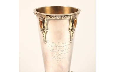 Silver and silver gilt presentation vase, raised on four sil...