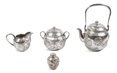 THREE-PIECE JAPANESE SILVER TEA SET, SIGNED 'SHIGEMITSU', TOGETHER WITH A MINIATURE SILVER SALT SHAKER, SIGNED 'KONOIJKE ZO JU GIN JUNG IN', CIRCA 1900 Height of miniature caddy: 2 in. (5.1 cm.)