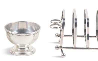 TIFFANY & CO. SILVER SET OF THREE OPEN SALTS AND AN AMERICAN SILVER TOAST RACK RETAILED BY TIFFANY & CO. Length of toast rack: 7 in. (17.8 cm.)