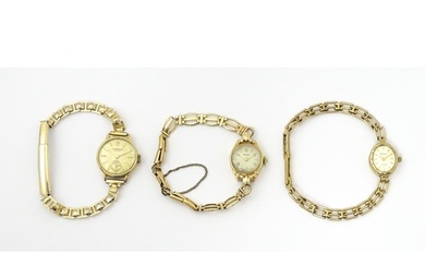 Three various 9ct gold ladies wristwatches, two with 9ct gol...