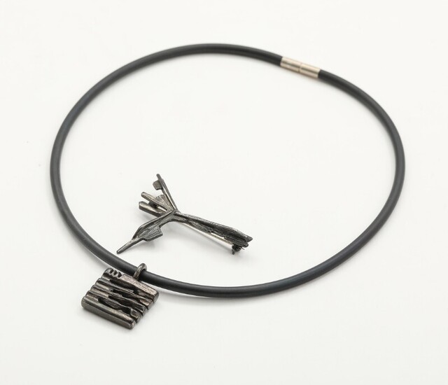 NOT SOLD. Toftegaard: An oxidized sterling silver" Ygdrasil" brooch and pendant. Kautschuk rubber and sterling...