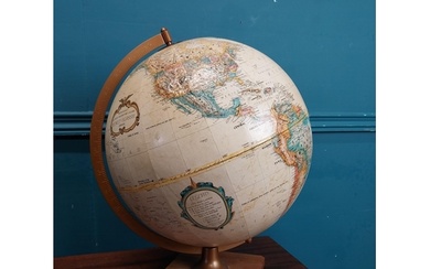 World Globe on wooden stand. {45 cm H x 33 cm Dia.}.