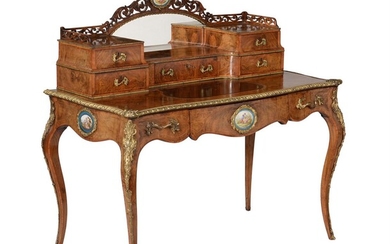 Y A Victorian figured walnut, porcelain and gilt metal mounted writing desk or dressing table