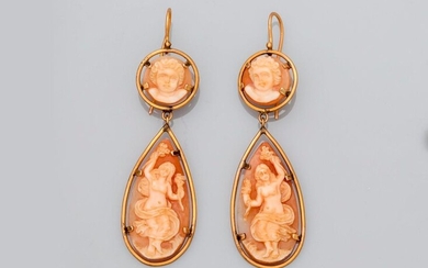 Yellow gold earrings, 585 MM, each made up of two cameos on shells set with cherub heads and two antique face to face dancers, length 6.5 cm, 19th c., weight: 11.9gr. gross.