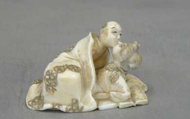 An ivory netsuke: the couple, erotic subject - L 5...