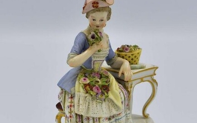 MEISSEN FIGURE OF A MAIDEN WITH FLOWERS