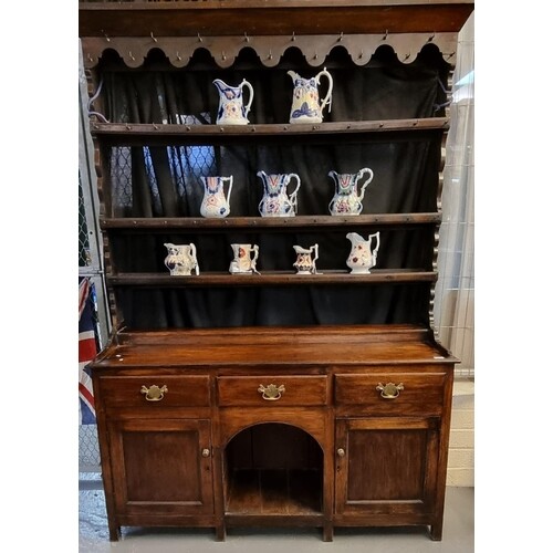 19th Century oak two stage open back dog kennel dresser, the...