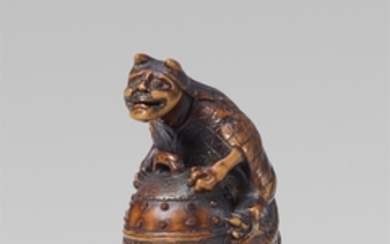 A boxwood netsuke of Kiyohime and the bell of Dôjôji. Second half 19th century