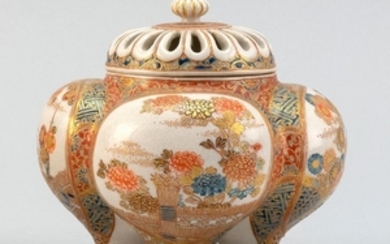 SATSUMA POTTERY KORO In four-lobed form. With brilliant floral design. Pierced cover with chrysanthemum finial. Diameter 4.75".