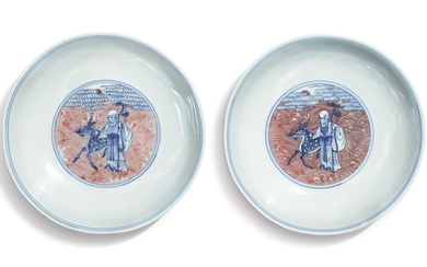 TWO UNDERGLAZE-BLUE AND COPPER-RED 'IMMORTALS' DISHES QING DYNASTY, 18TH / 19TH CENTURY