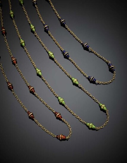 Three yellow gold rope chain necklaces with blue, red