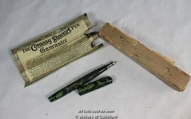 A Conway Stewart green marble effect fountain pen in original box with instructions.
