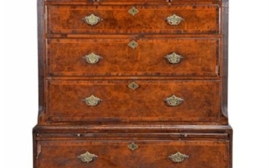 A George II burr walnut and feather banded chest on chest
