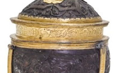 A GERMAN GILT-COPPER MOUNTED COCONUT CUP AND COVER, POSSIBLY NUREMBERG, CIRCA 1550