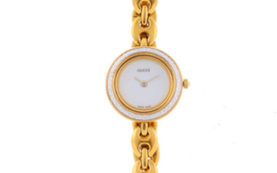 GUCCI - a lady's gold plated bracelet watch. View more details