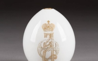 A LARGE PORCELAIN EASTER EGG WITH MONOGRAM OF THE
