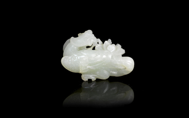 A pale green jade 'phoenix' carving