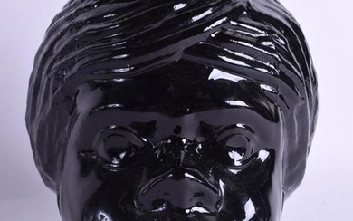A RARE AMERICAN 1920S MOULDED BLACK GLASS COOKIE JAR in