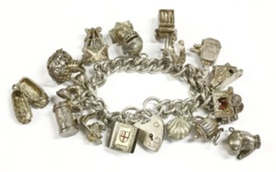 A silver charm bracelet with padlock