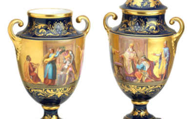 A pair of Vienna style twin handled vases