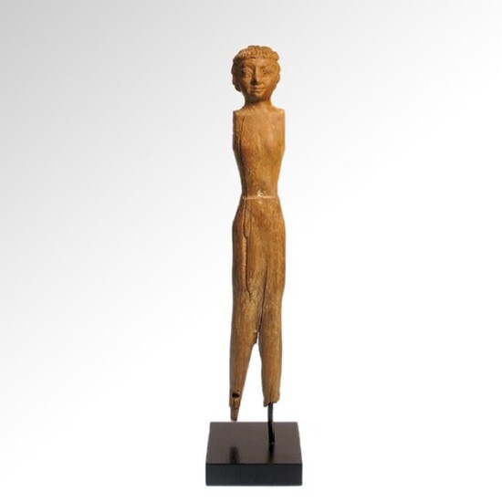 Egyptian Wooden Figure of a Man, New Kingdom, Dynasties