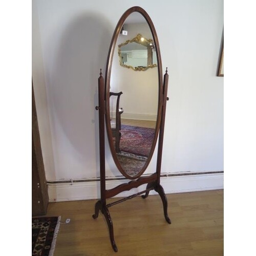 A 20th century cheval mirror in good polished condition, 160...