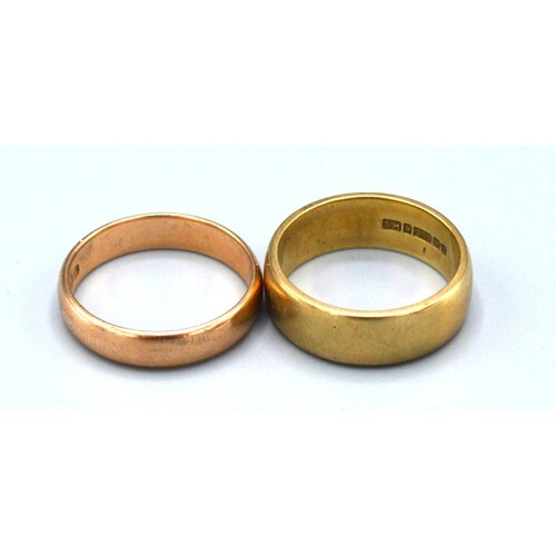 A 9ct. Gold Wedding Band together with another similar 9ct. ...