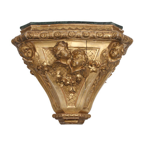 A Baroque Style Marble Top Giltwood Bracket