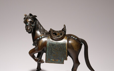 A CHINESE BRONZE AND TURQUOISE INSET INCENSE BURNER MODELLED AS A STALLION