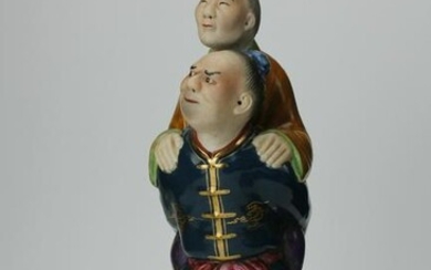 A Chinese Ceramic Figurine of Son Carrying Mother