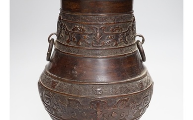 A Chinese archaistic bronze vase, hu, Xuande mark, 19th cent...