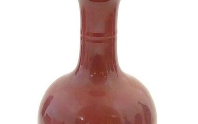 A Chinese bottle vase with a flared rim. Character