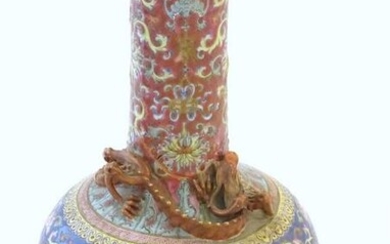A Chinese bottle vase with scrolling floral and foliate