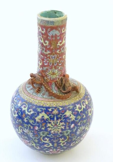 A Chinese bottle vase with scrolling floral and foliate