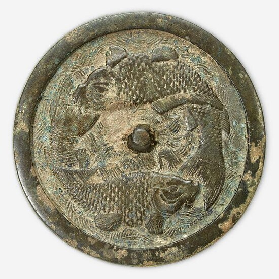 A Chinese bronze "Twin Carp" circular mirror