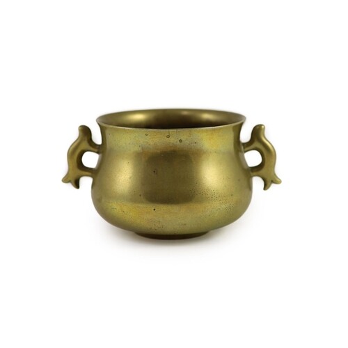 A Chinese bronze baluster shaped censer, gui, Xuande mark bu...