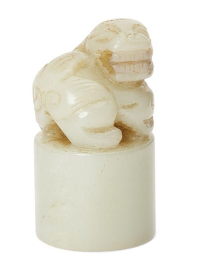 A Chinese pale green jade seal, late Qing dynasty, carved...