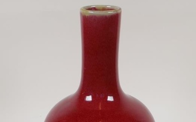 A Chinese sang de boeuf glazed porcelain bottle vase,...