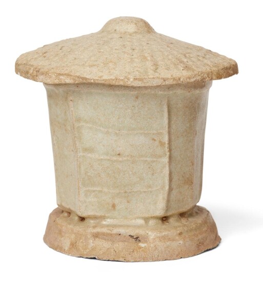 A Chinese stoneware granary jar, Song dynasty, of polygon form standing on a waisted splayed foot, with a domed cover imitating bamboo hat, base concave, 8.5cm high. (2) 宋 米白釉斗笠式盖罐