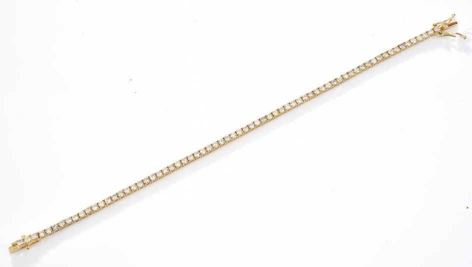 A DIAMOND LINE BRACELET, DIAMONDS TOTALLING 3.60CTS IN 18CT GOLD