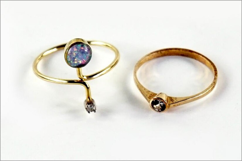 A Diamond and 14 Karat Yellow Gold Ring.