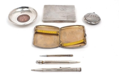A Dunhill silver cigarette case, London, 1945, of rectangular, engine turned design, 8.1 x 10.3cm; together with a silver dish with a 1797 copper Britannia Penny to base, Chester, 1902, Andrew Barrett & Sons, 9cm dia.; a further silver cigarette...