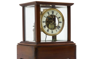 A Eureka electric mahogany mantel clock