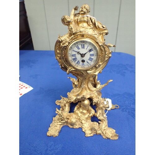 A FRENCH LOUIS XV STYLE ORMOLU CLOCK 26cms height, damaged c...